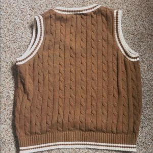 Brown John Galt sweater vest from Pacsun.